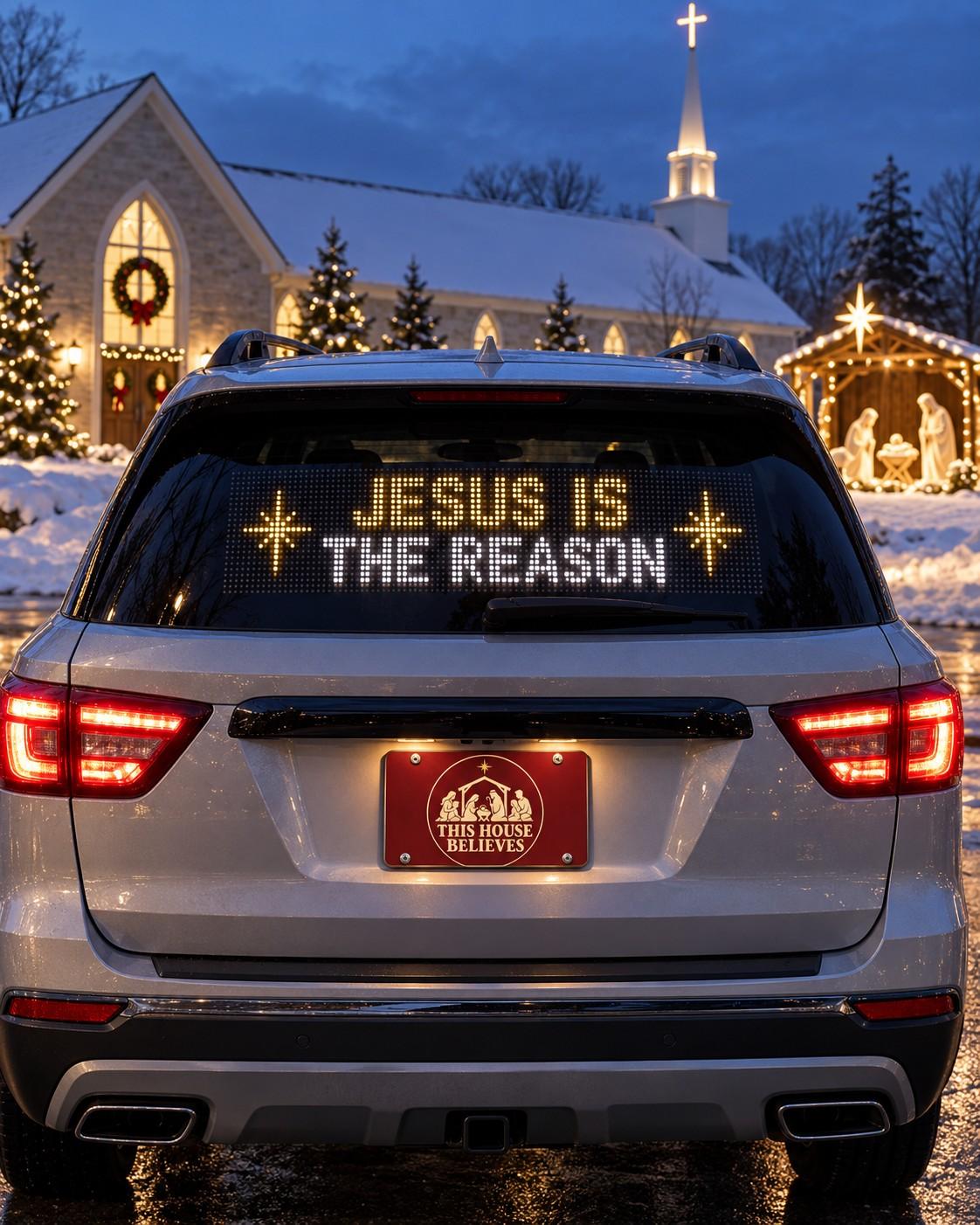 Pickup truck in a church parking lot with JESUS IS THE REASON glowing in the rear window